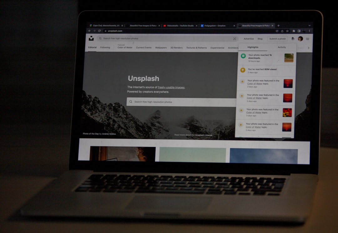 services-01 Unsplash website on a laptop