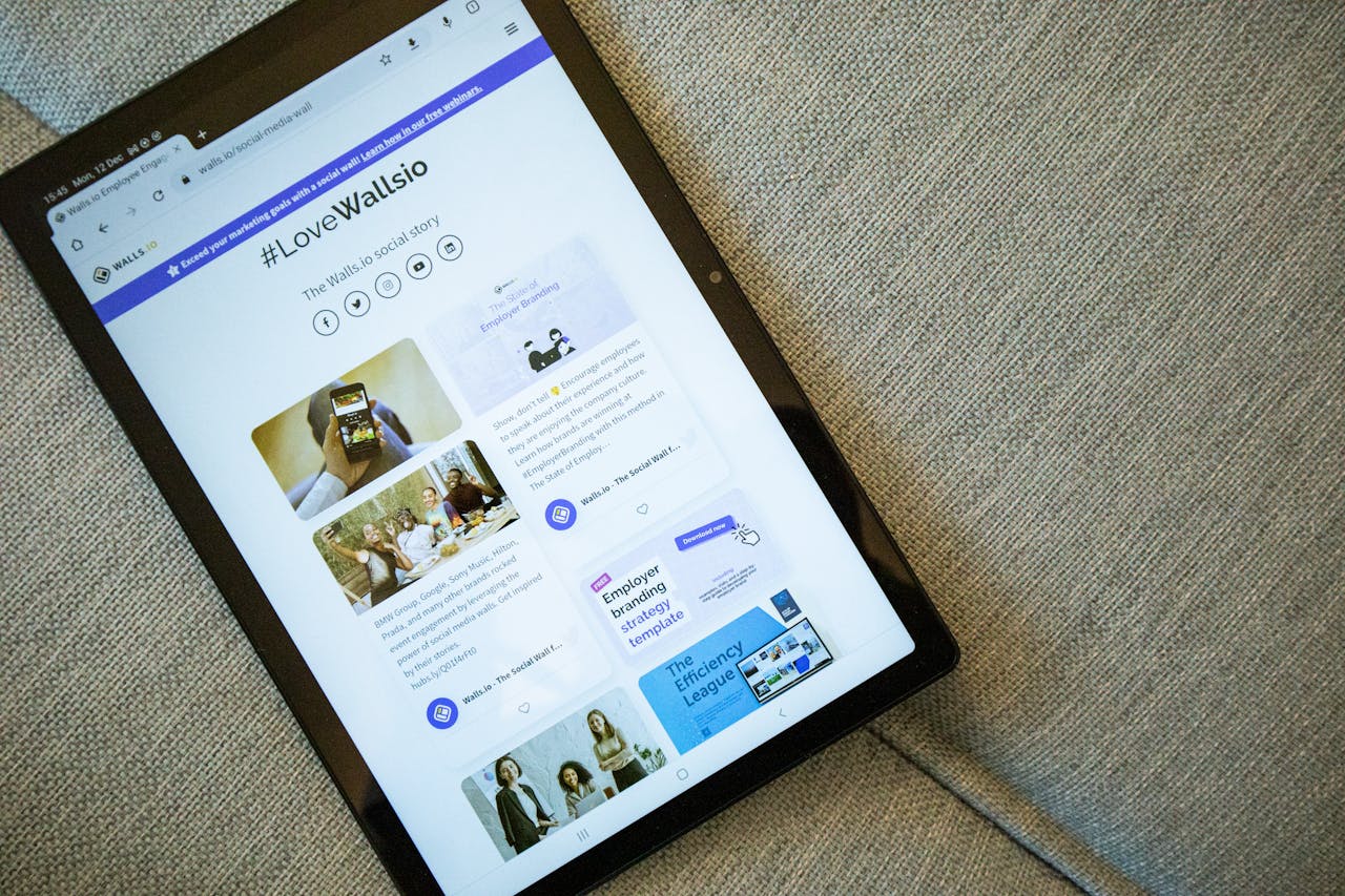 gallery-2 A tablet on a couch showing the Wallis.io website interface.